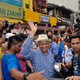 Former prime minister Mahathir Mohamad waves to activists at the Bersih rallies yesterday (Aug. 30).